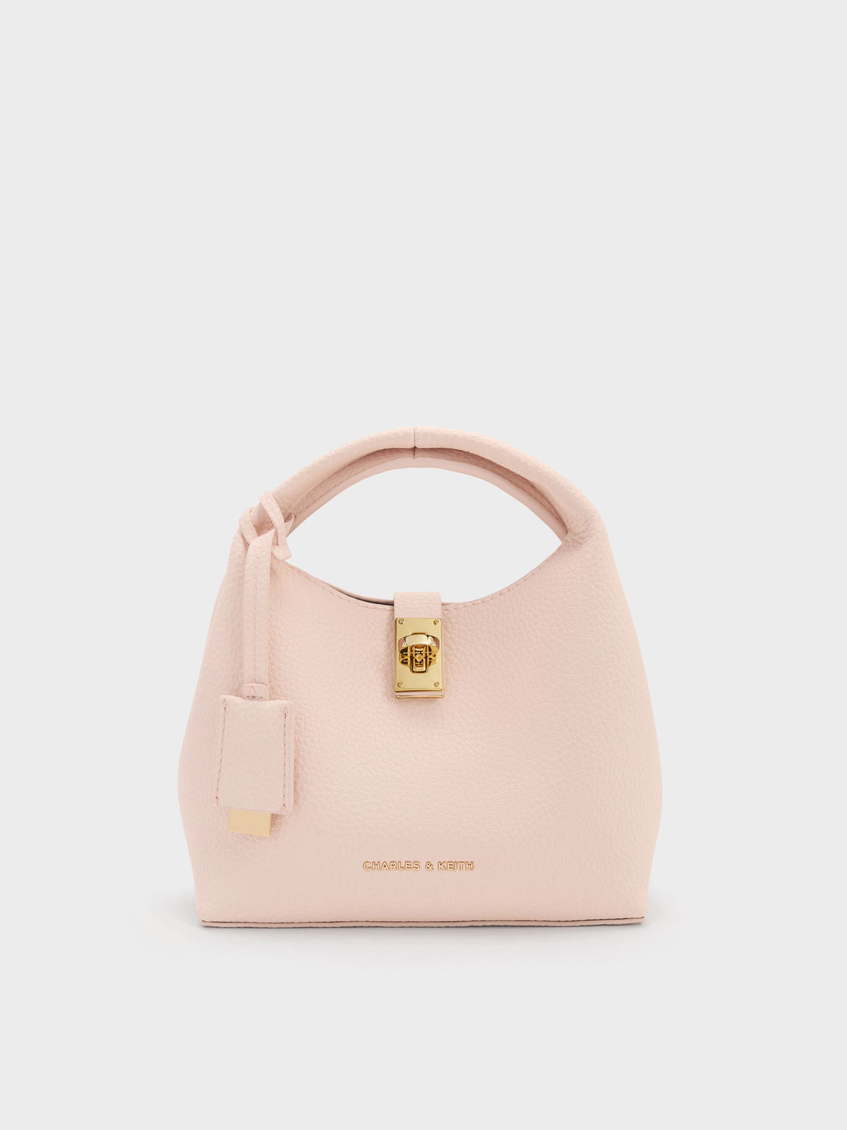CHARLES & KEITH Mini Chance Turn-Lock Bucket Bag - Soft Pink